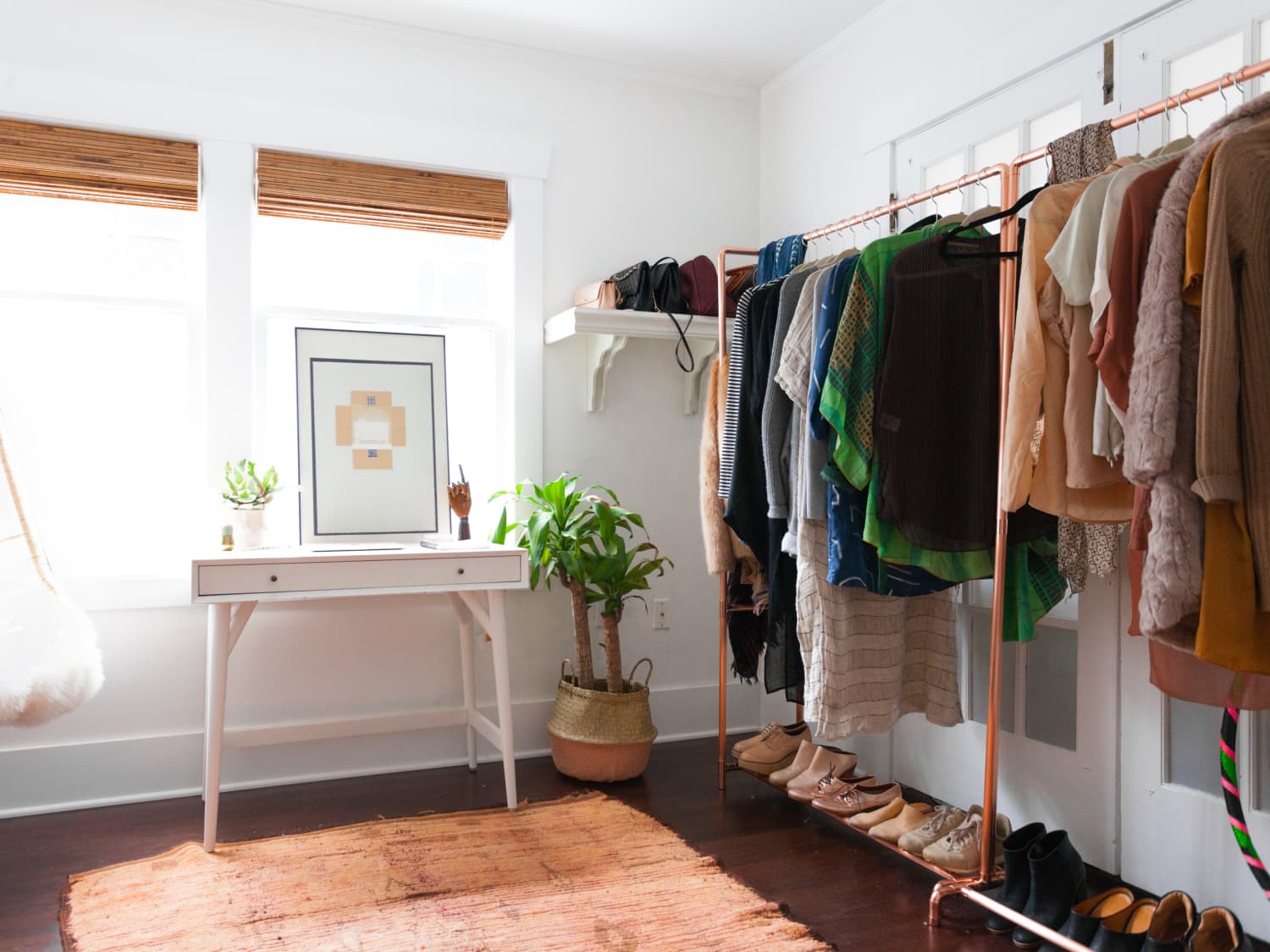 An Open Closet Could Be the Answer to Keeping Your Bedroom Clutter